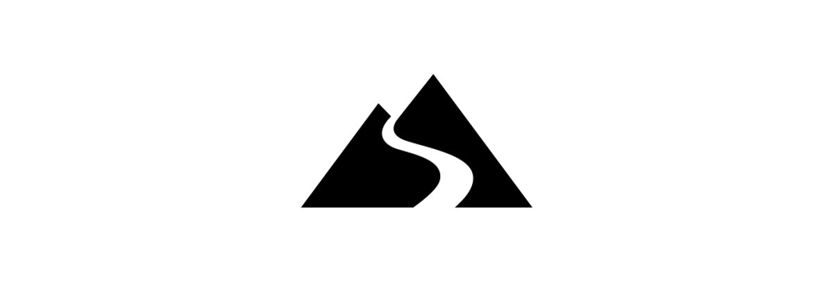 A black mountain with a white path winding up it