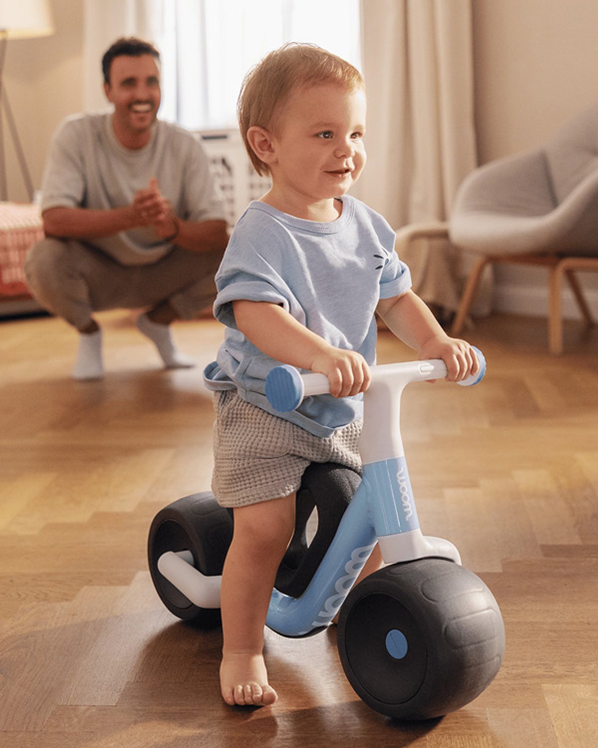 Little kid riding self-balancing wow bike on their own.