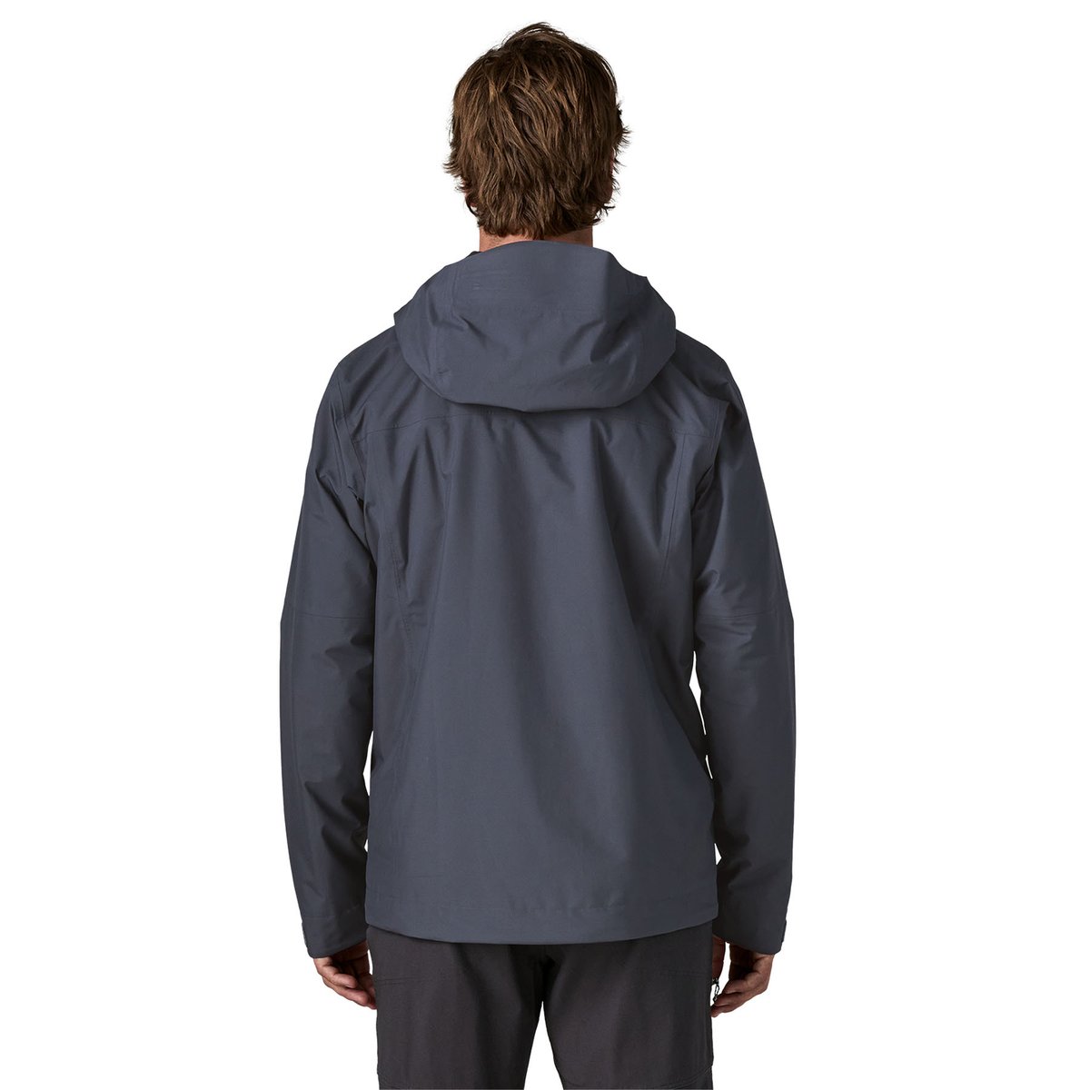 A view from the back of a man wearing the Insulated Boulder Fork Rain Jacket