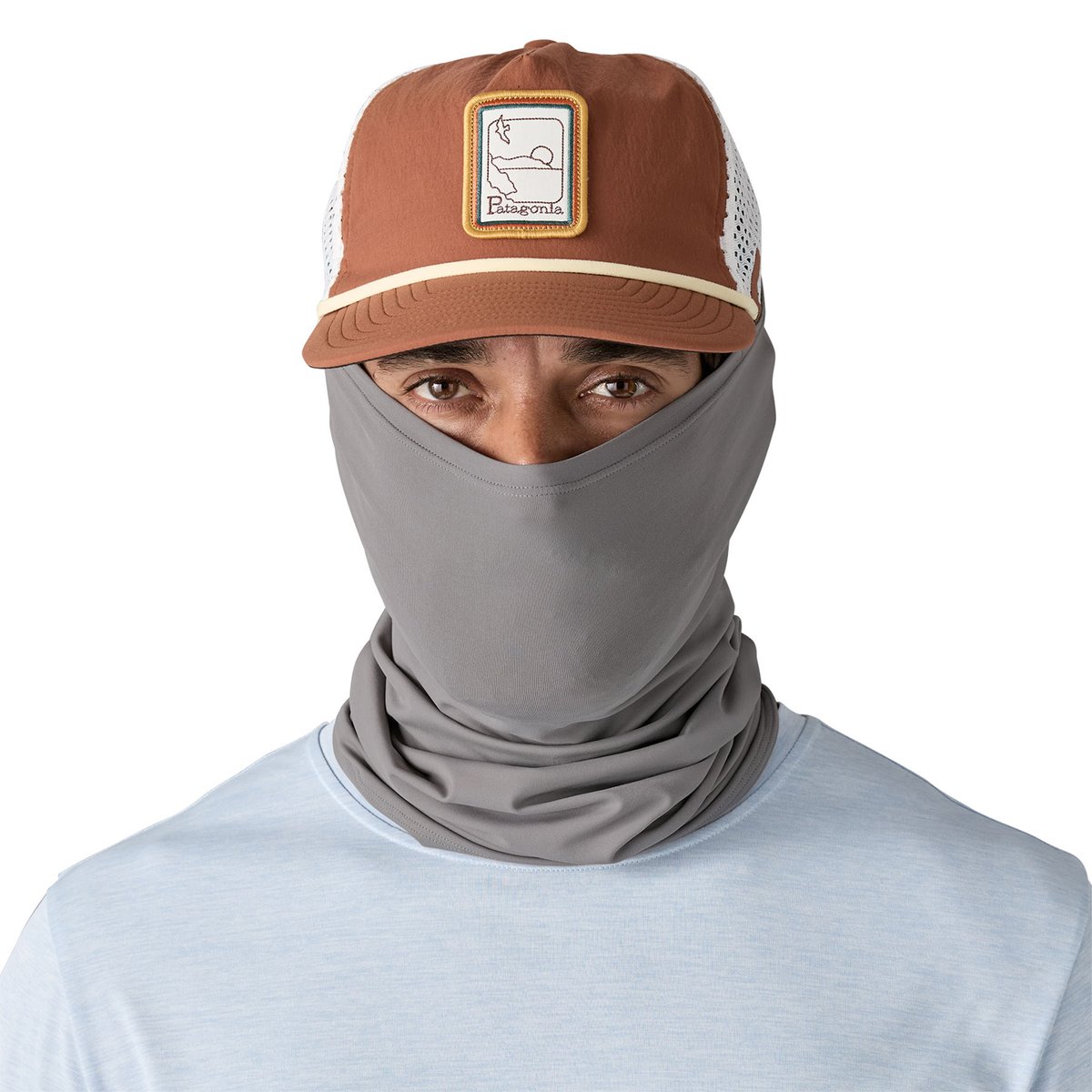 A man wears the Patagonia Sun Mask over his mouth and nose. 