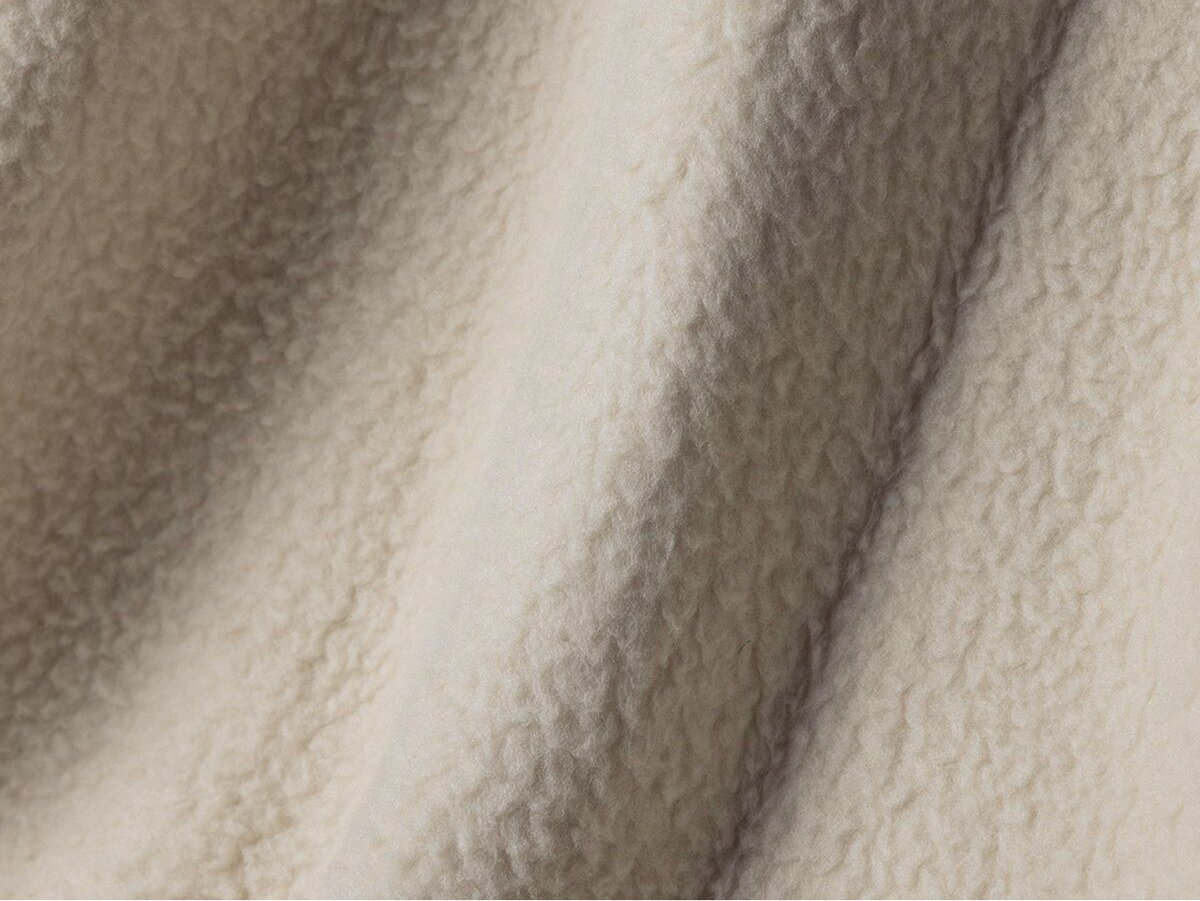 Close up of white fleece material fuzzy texture.