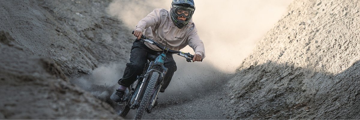 A person riding an ebike aggressively.
