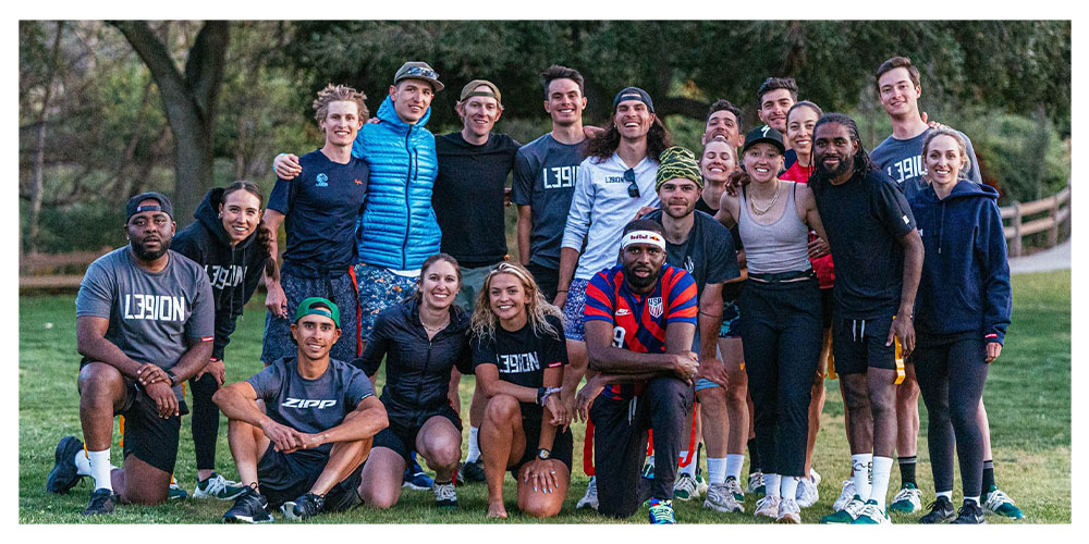 legion team members standing posing for a group photo after a flag football game