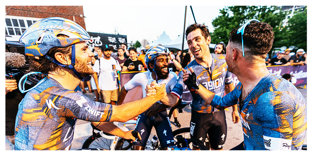 Legion riders at finish, smiling and celebrating